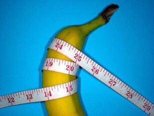 Banane und Zentimeter symbolisieren einen vergrößerten Penis